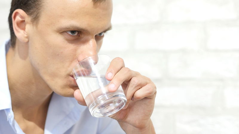 man_drinking_water