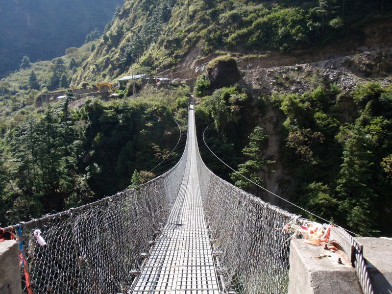 Crossing_the_Suspension_Bridge_below_Ghasa