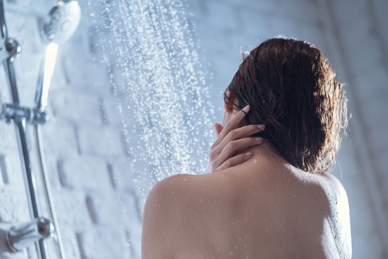 A Woman Taking a Shower