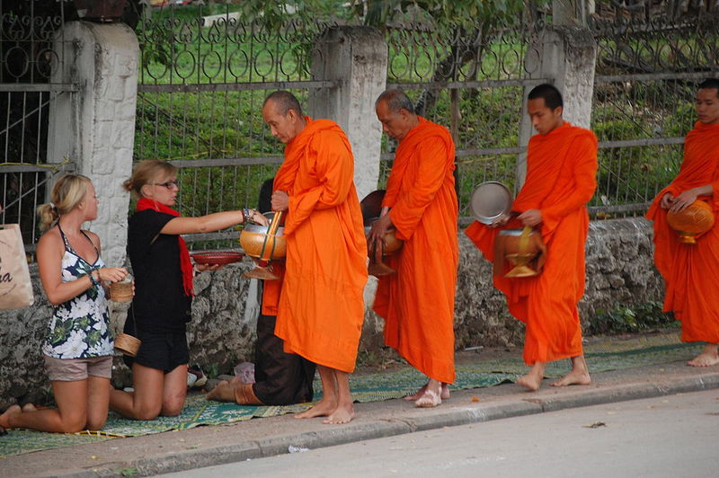 sit with feet behind in Thailand