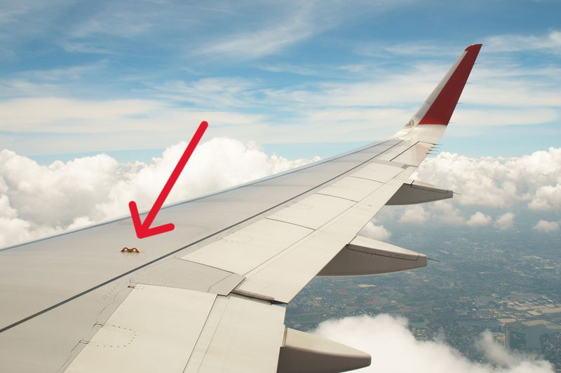 Airplane Wing Holes for Over-Wing Exits 